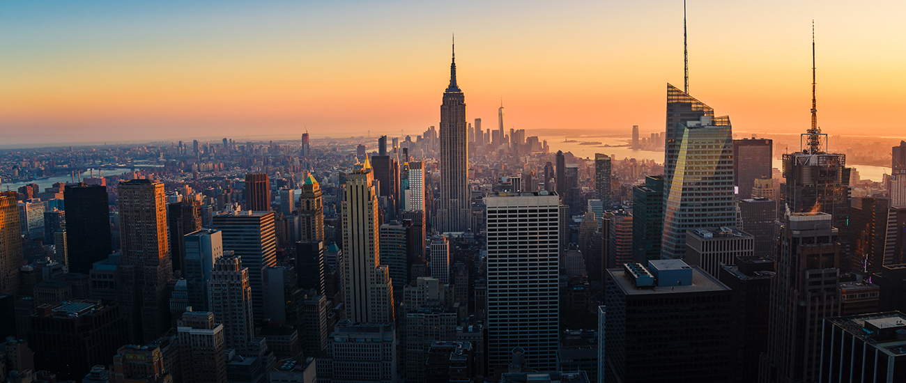 A picturesque city skyline at dusk at New York, NY